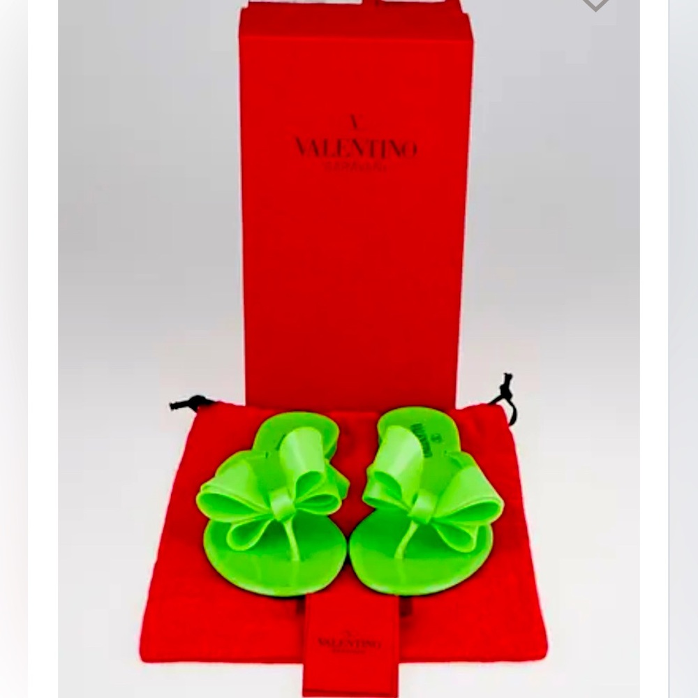 Valentino Neon Green Sandels
with Valentino box, dust bag, and card
Size: 41